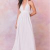 White cotton halter maxi dress with a deep v neckline and a small smocked waist band.