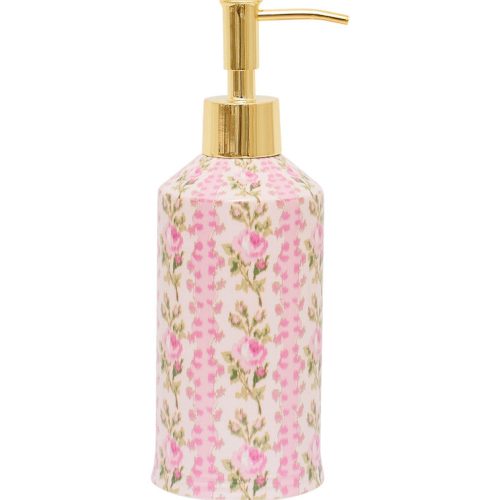 Pink floral lotion dispenser with gold hardware