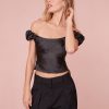 Off-the-shoulder top in luxe satin fabric.