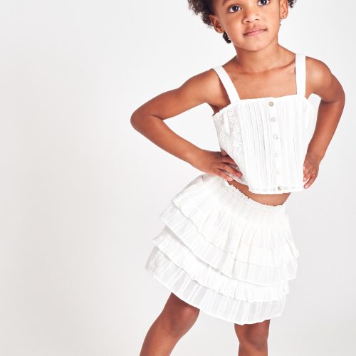 White two-tiered ruffle mini skirt.