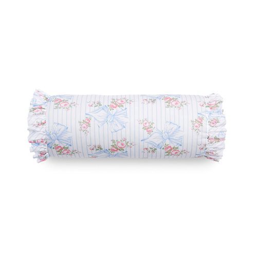 Bolster pillow with ruffle details and a floral bow print.