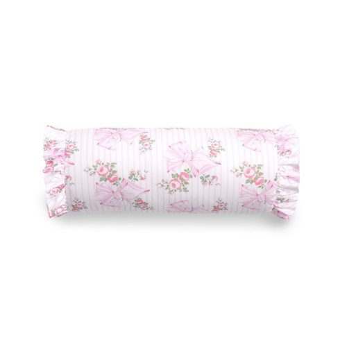 Bolster pillow with ruffle details and a floral bow print.