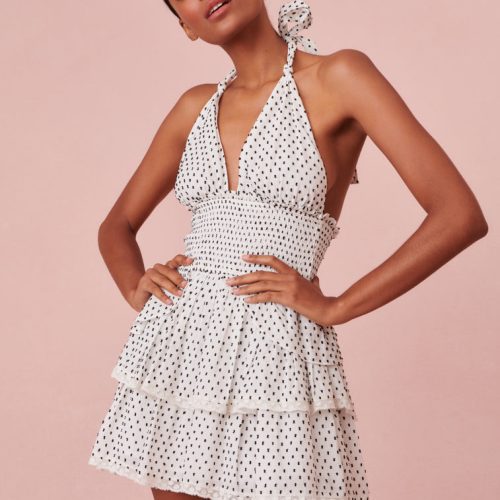 Dotted halter dress with two tiered ruffled skirt.