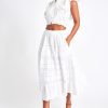 White midi skirt with lace detailing throughout the skirt as well as on the bottom trim