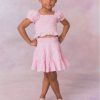 Pink gingham three tiered ruffle skirt, with elastic waistband for girls.