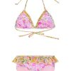 Girls two-toned floral printed two-piece bikini. The triangle top has ruffle lining the interior seams and halter ties. The bottom has a classic cut with a ruffle flounce.