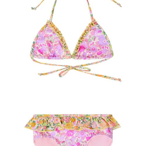 Girls two-toned floral printed two-piece bikini. The triangle top has ruffle lining the interior seams and halter ties. The bottom has a classic cut with a ruffle flounce.