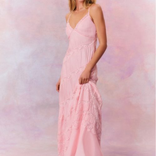 Maxi dress featuring a custom lace throughout and a beautiful V-neck line.