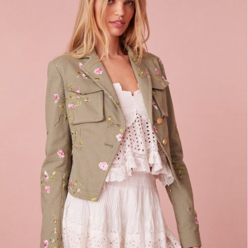 Floral military jacket with pockets on the front and custom gold military buttons at the center. This piece has a 40s-inspired waist with peplum details and princess seams.