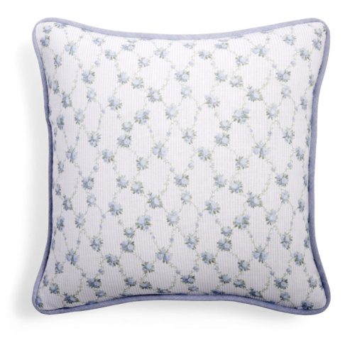 Throw pillow with a blue floral print.