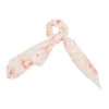 White scrunchie with light pink floral detail.