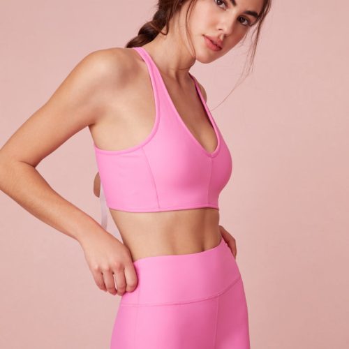 Light Support - Sports Bra with u shape neckline and crossed back straps.